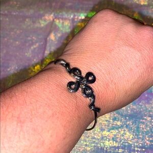 Elegant Silvertone Knot Cross Bangle Bracelet